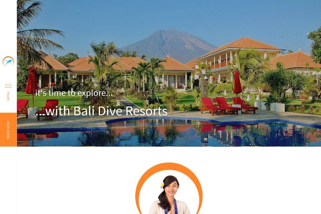Homepage of Bali Dive Resorts featuring tropical villas, swimming pool, Mount Agung in background, and red poolside lounge chairs